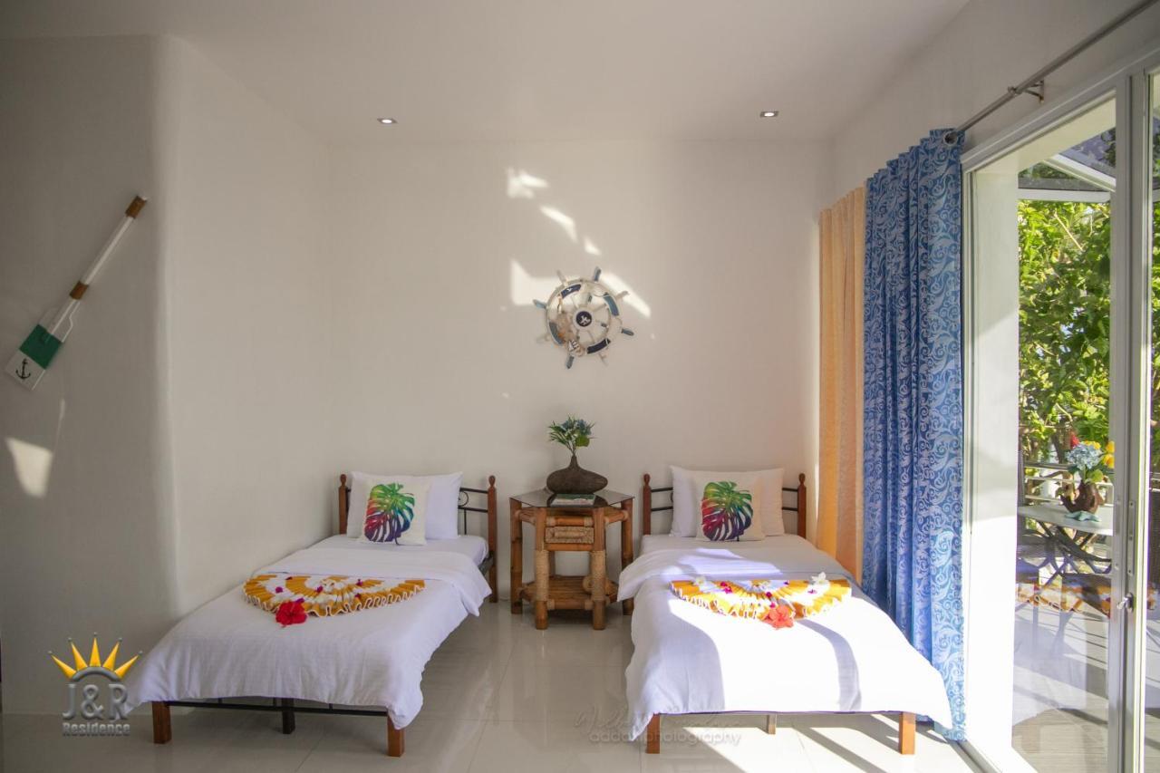 เจแอนด์อาร์ เรสซิเดนส์ Hotel อันดา ภายนอก รูปภาพ